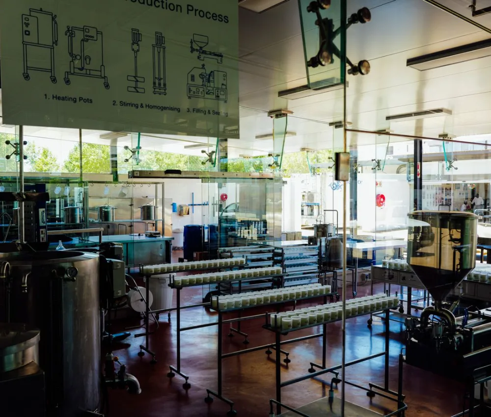 Modern food production floor with stainless steel processing and filling lines